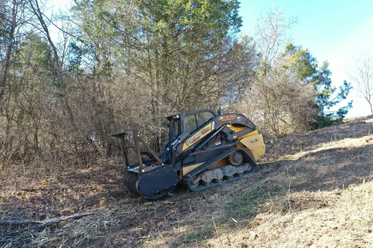 Aerial view of mulcher working on hillside